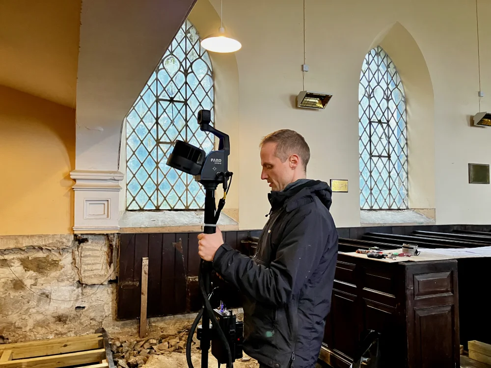 Ian Jenkins scanning the church